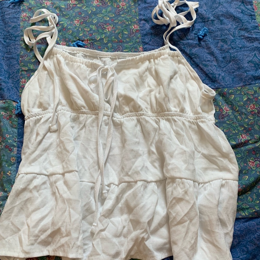 white ruffle shirt